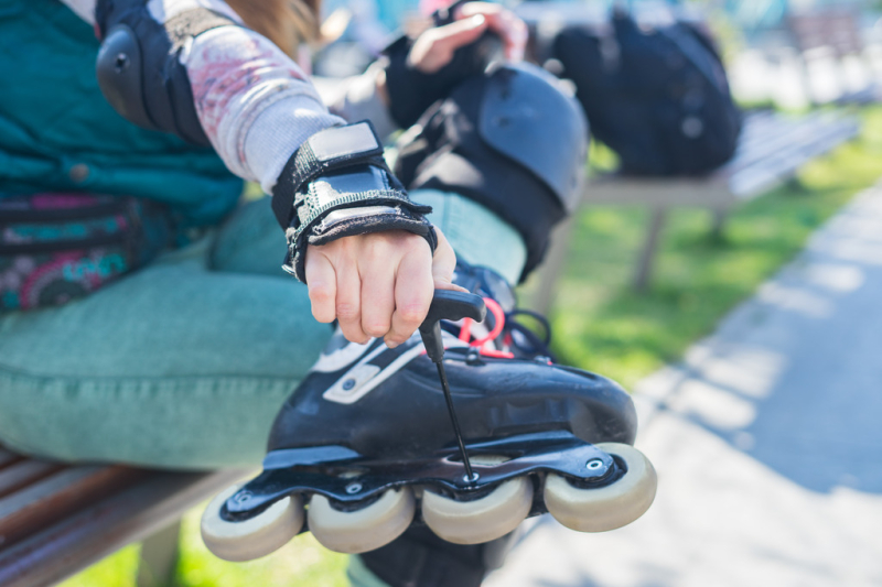 roller-girl-unscrewing-wheels-on-roller-skates-wit-2023-11-27-05-18-48-utc.jpg